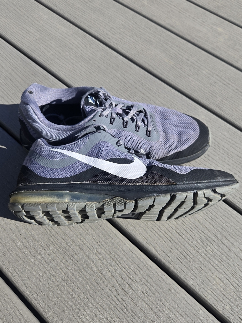 Very Worn Nike Men's Running Shoes in Grey and Black with White Swoosh
